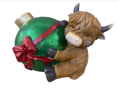 Koe met kerstbal