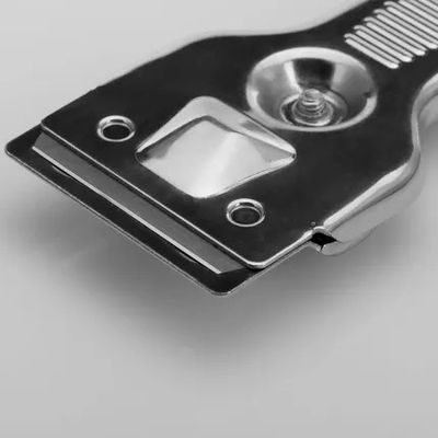 Grattoir pour plaque de cuisson