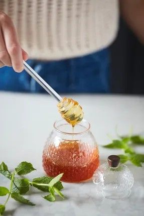 Set van honingpot en lepel