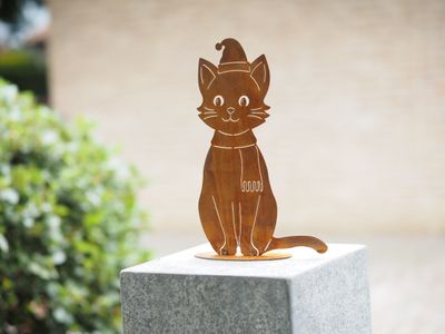 Kat met sjaal en kerstmuts op basis