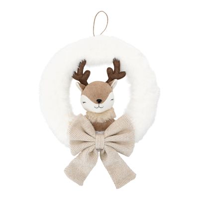 Renne sur une couronne en peluche