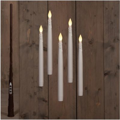 Bougies flottante avec baguette magique